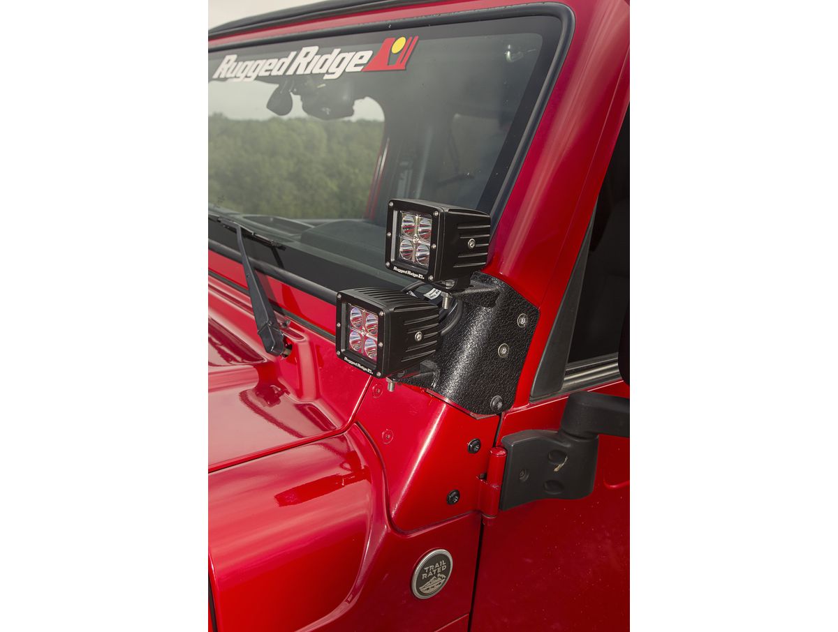 This Dual A-Pillar Light Mount from Rugged Ridge Fits 97-06 Jeep Wrangler TJ/Lj. Rugged Ridge