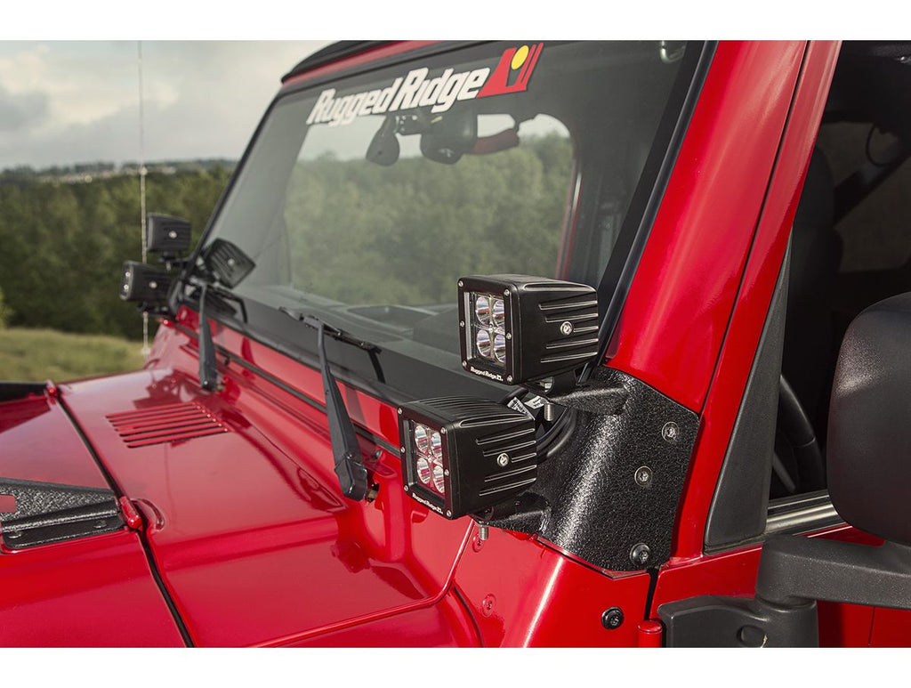 This Dual A-Pillar Light Mount from Rugged Ridge Fits 97-06 Jeep Wrangler TJ/Lj. Rugged Ridge
