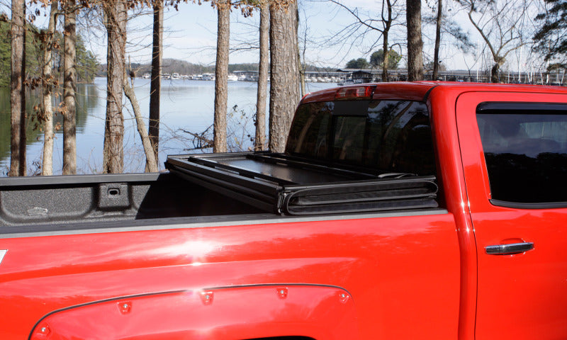 Lund 88-99 Chevy C1500 Fleetside (8ft. Bed) Hard Fold Tonneau Cover - Black