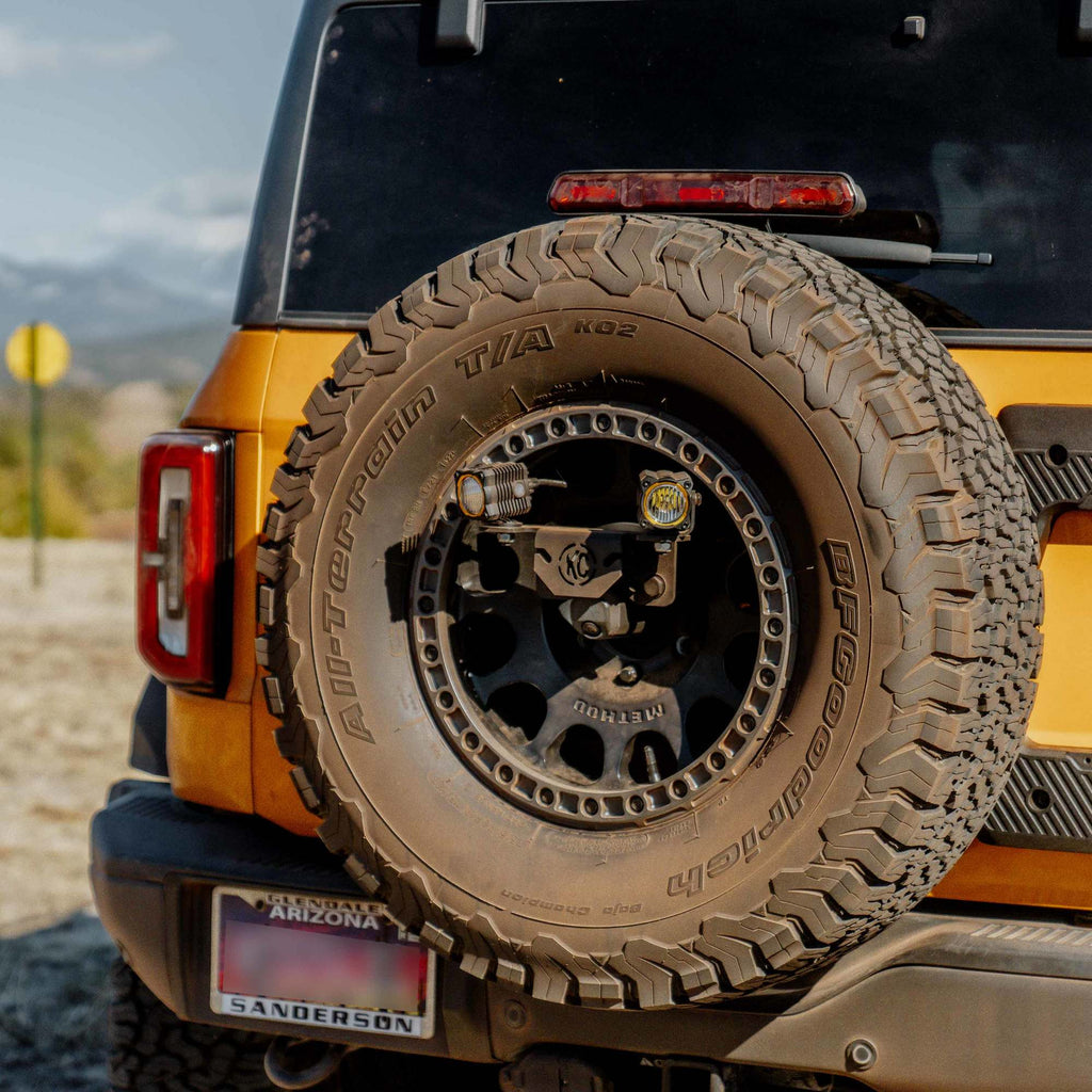 Spr Tir Carr (M14x1.5 Lug) 18+ Jeep Wrangler JL /21+ Ford Bronco Raptor KC HiLiTES