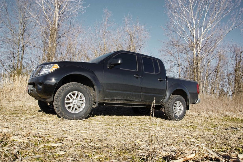 2.5 Inch Leveling Kit Red Spacers Front Nissan Frontier (05-26)/Xterra (05-15) Rough Country