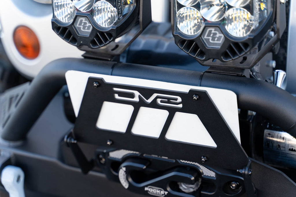 Fairlead Mounted Flip Up License Plate Bracket DV8 Offroad