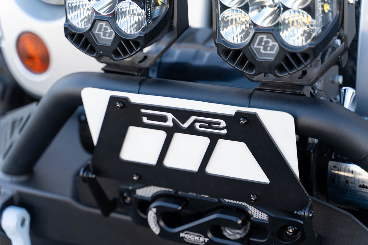 Fairlead Mounted Flip Up License Plate Bracket DV8 Offroad