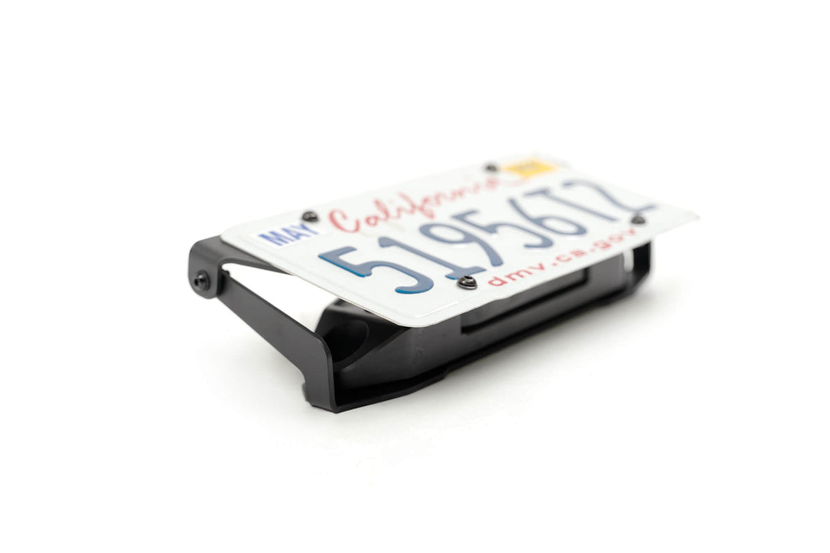 Fairlead Mounted Flip Up License Plate Bracket DV8 Offroad