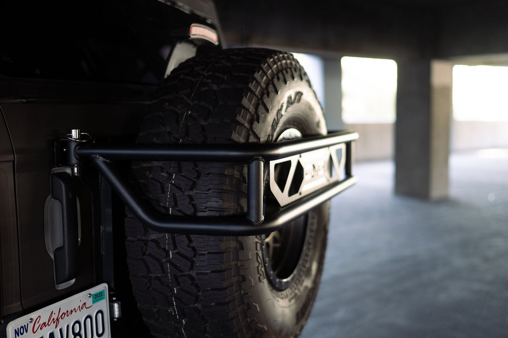 2021 2024 Ford Bronco Spare Tire Guard Accessory Mount DV8 Offroad
